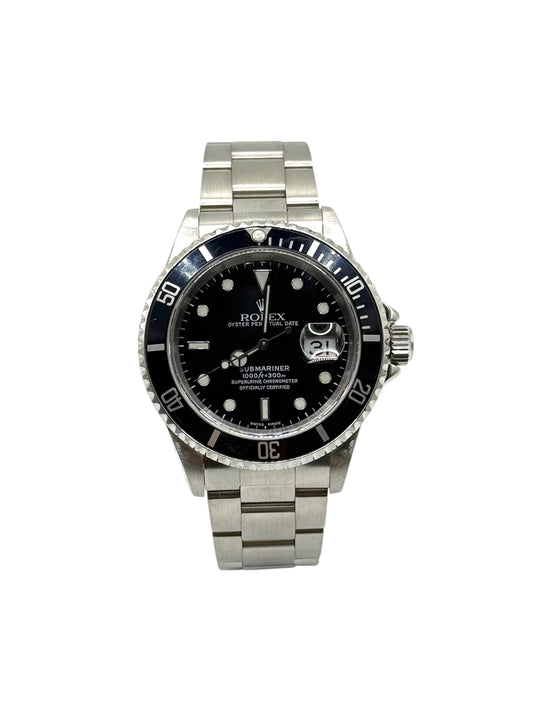 Rolex submariner date watch with black dial and stainless steel metal bracelet on a white background, P-serial